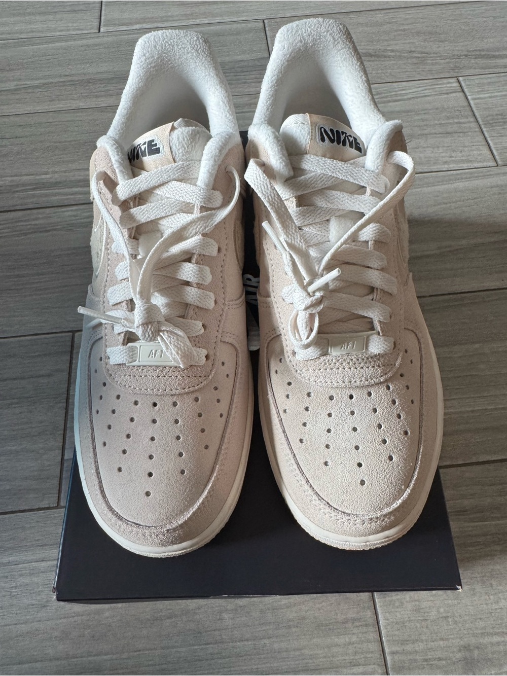 Nike Low-Top Sneakers in Cream and Black